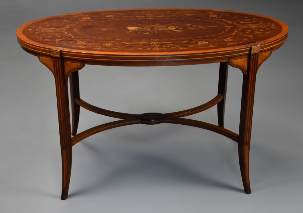 Fine quality Edwardian inlaid mahogany coffee table of oval form View VI