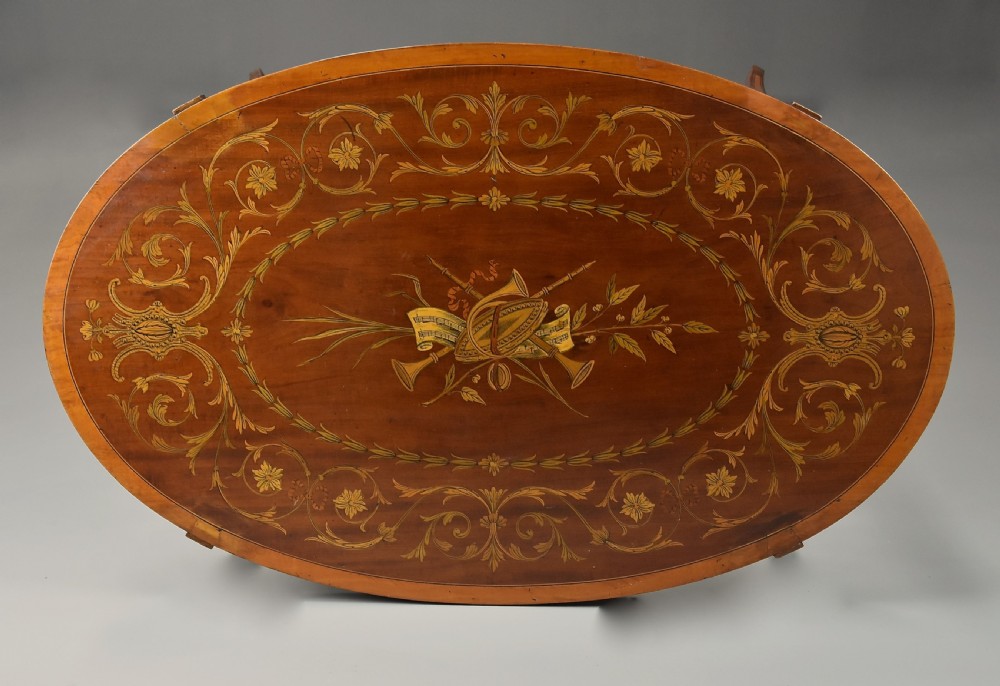Fine quality Edwardian inlaid mahogany coffee table of oval form View IX