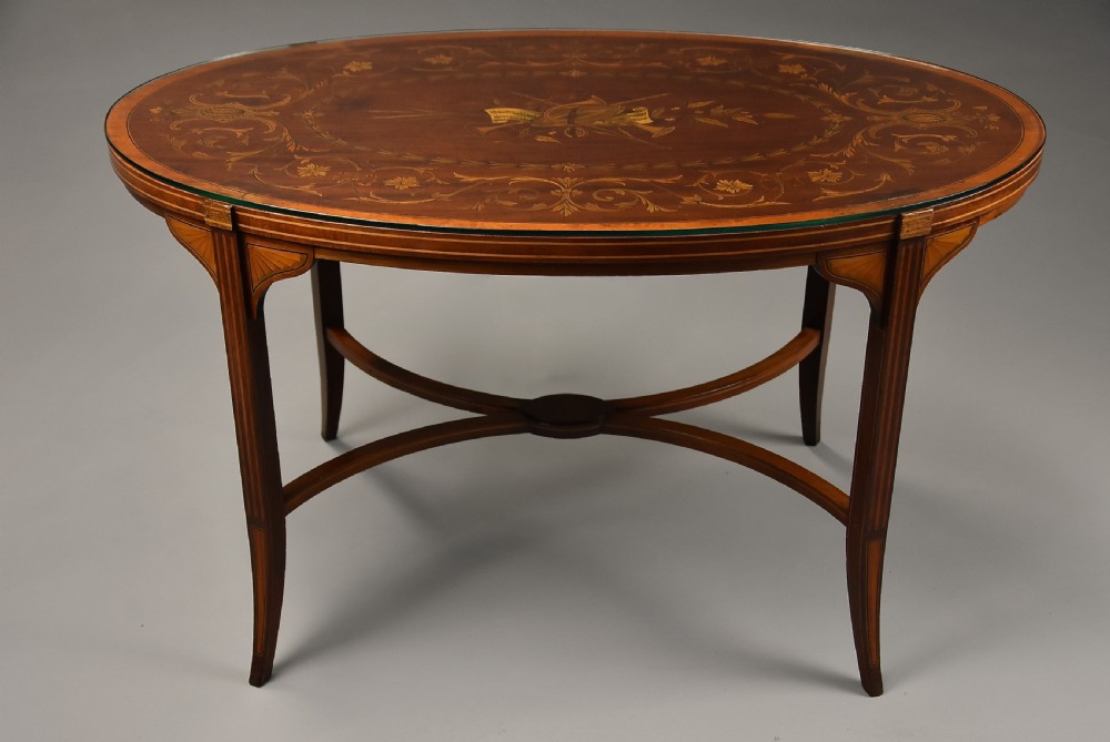 Fine quality Edwardian inlaid mahogany coffee table of oval form View XI
