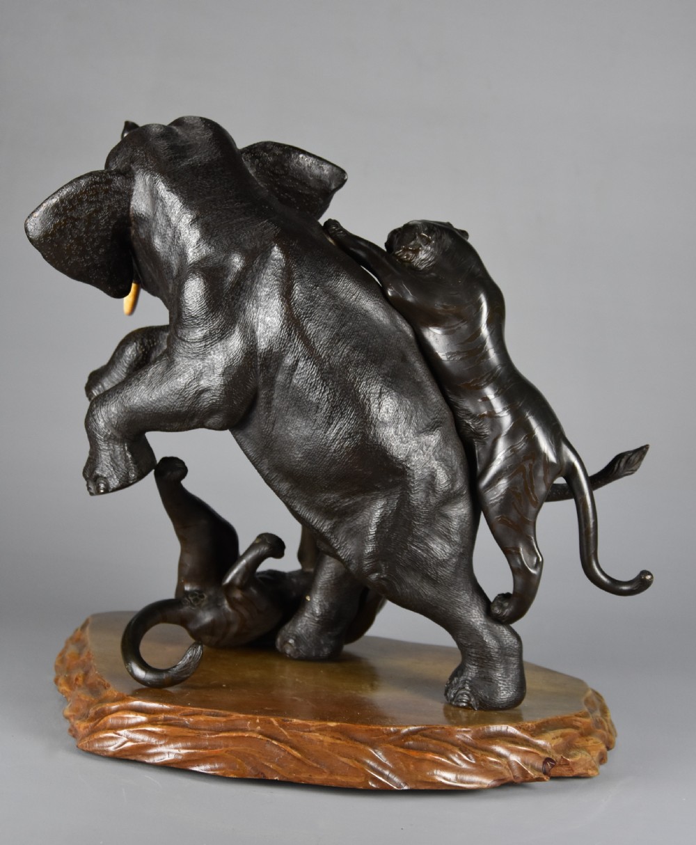 Large fine quality late 19th century Meiji Japanese bronze elephant & tiger group by animalier specialist Genryusai Seiya View IX