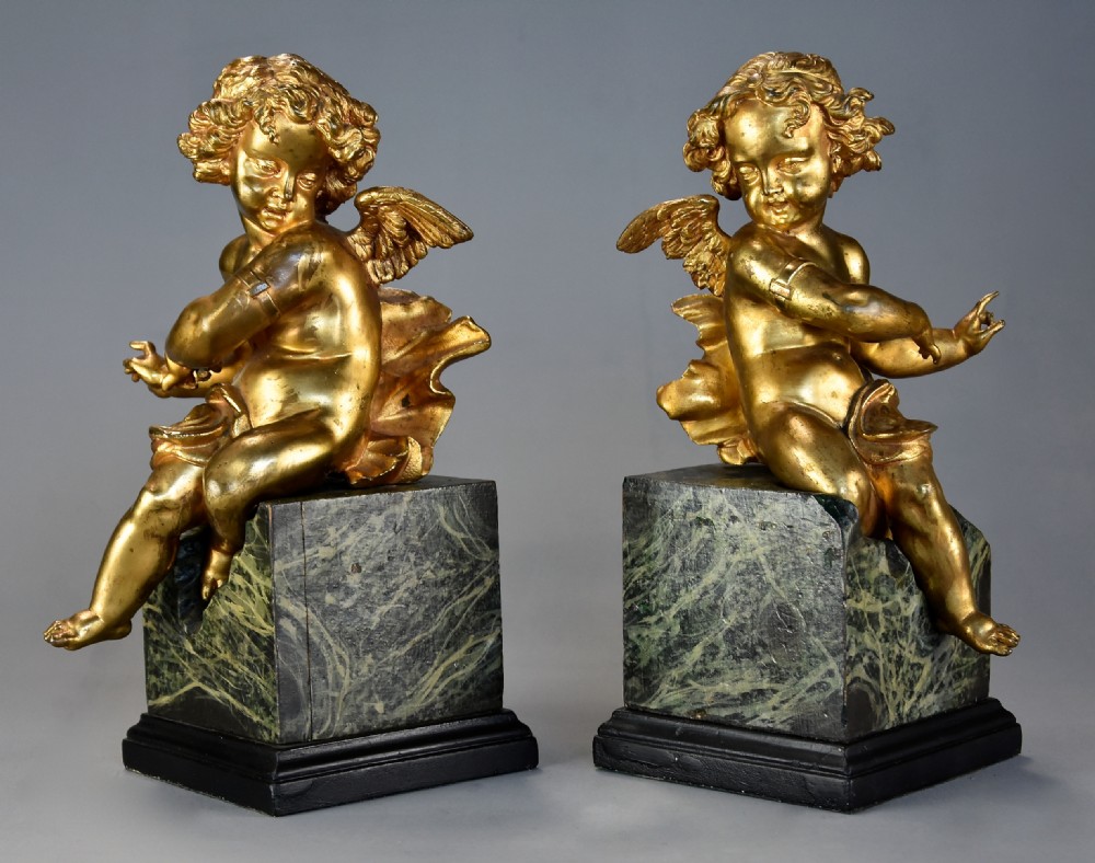 Pair of fine quality early 19th century French ormolu winged cherubs supported on faux marble bases View IV