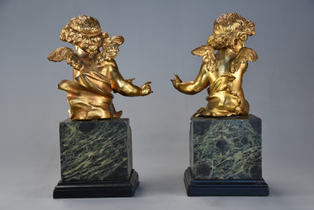 Pair of fine quality early 19th century French ormolu winged cherubs supported on faux marble bases View XI
