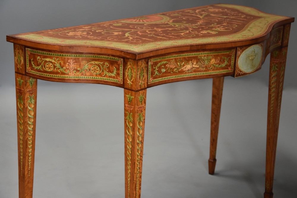 Superb pair of Sheraton revival satinwood & painted serpentine shaped console tables View VI