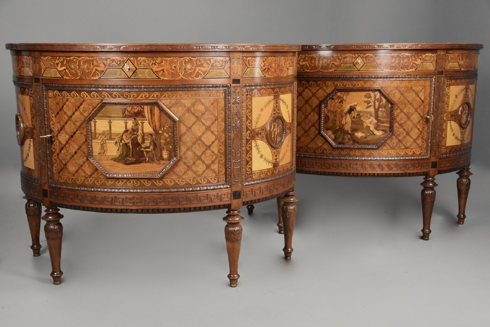 A pair of Italian Neoclassical demi-lune side cabinets featuring intricate floral and figurative marquetry inlay with tapered turned legs. View III