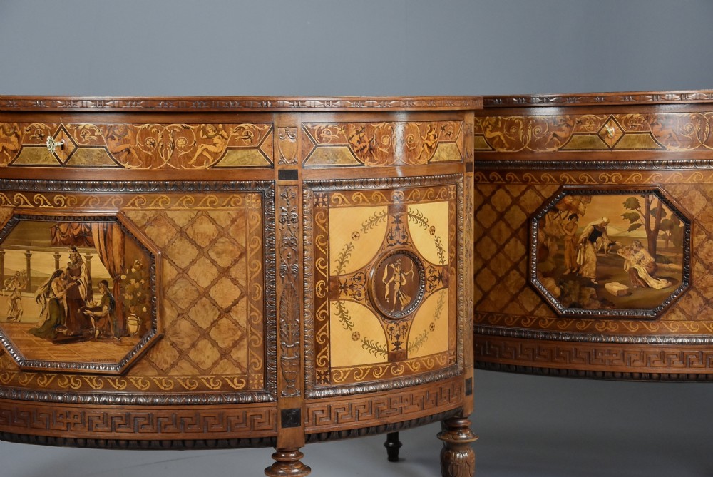 A pair of Italian Neoclassical demi-lune side cabinets featuring intricate floral and figurative marquetry inlay with tapered turned legs. View VII