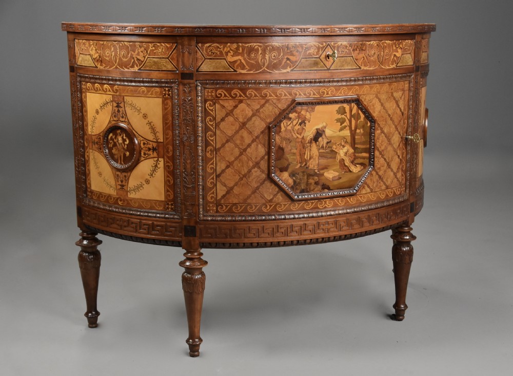A pair of Italian Neoclassical demi-lune side cabinets featuring intricate floral and figurative marquetry inlay with tapered turned legs. View VIII