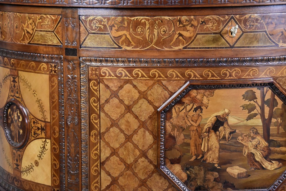 A pair of Italian Neoclassical demi-lune side cabinets featuring intricate floral and figurative marquetry inlay with tapered turned legs. View XI