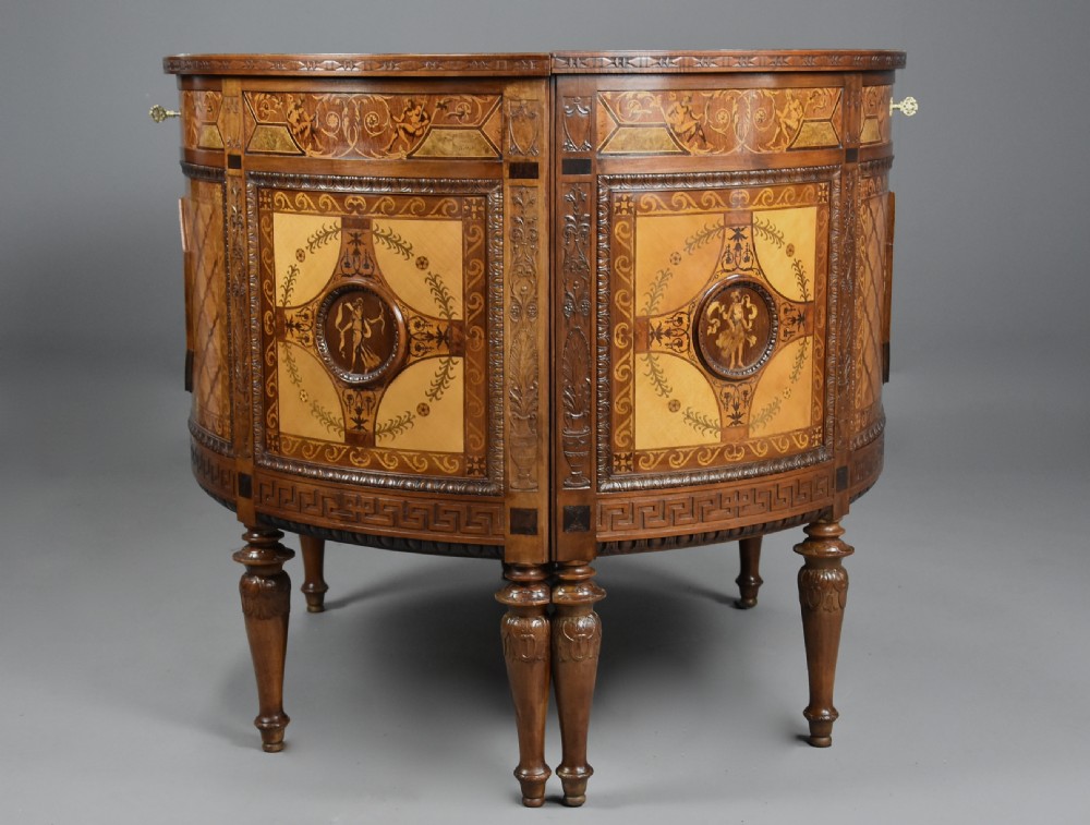 A pair of Italian Neoclassical demi-lune side cabinets featuring intricate floral and figurative marquetry inlay with tapered turned legs. View XIX