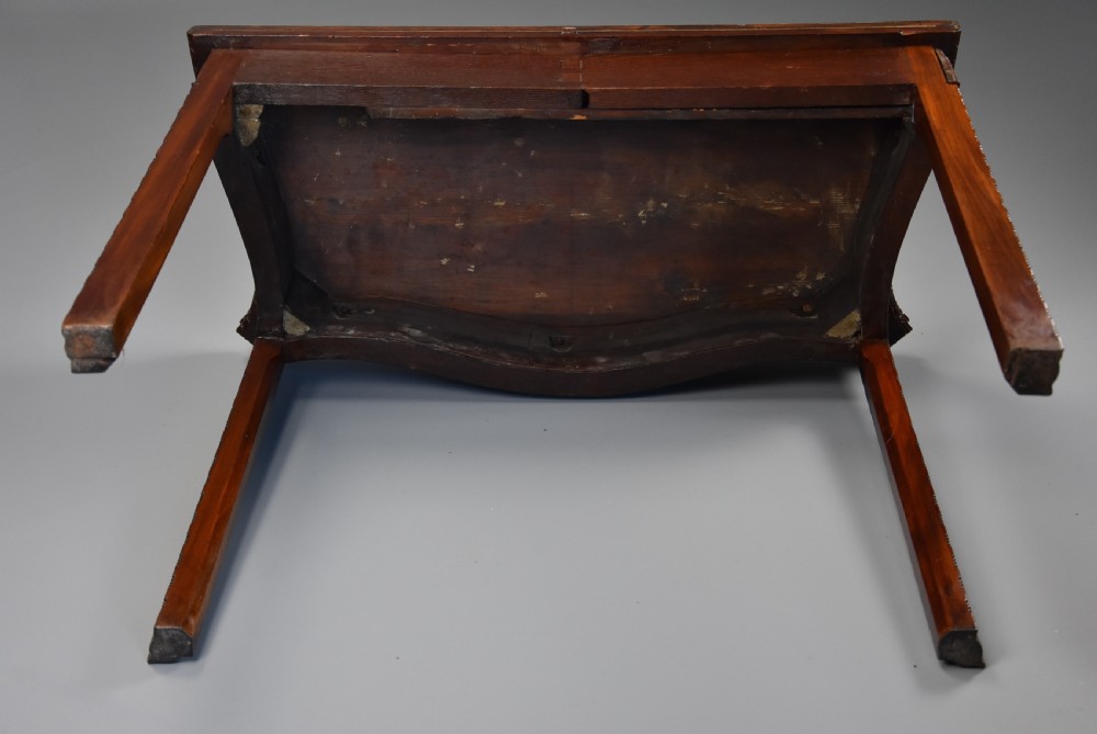 A late 19th-century Chippendale style mahogany card table featuring a serpentine front with carved foliage and square molded legs. View XIII