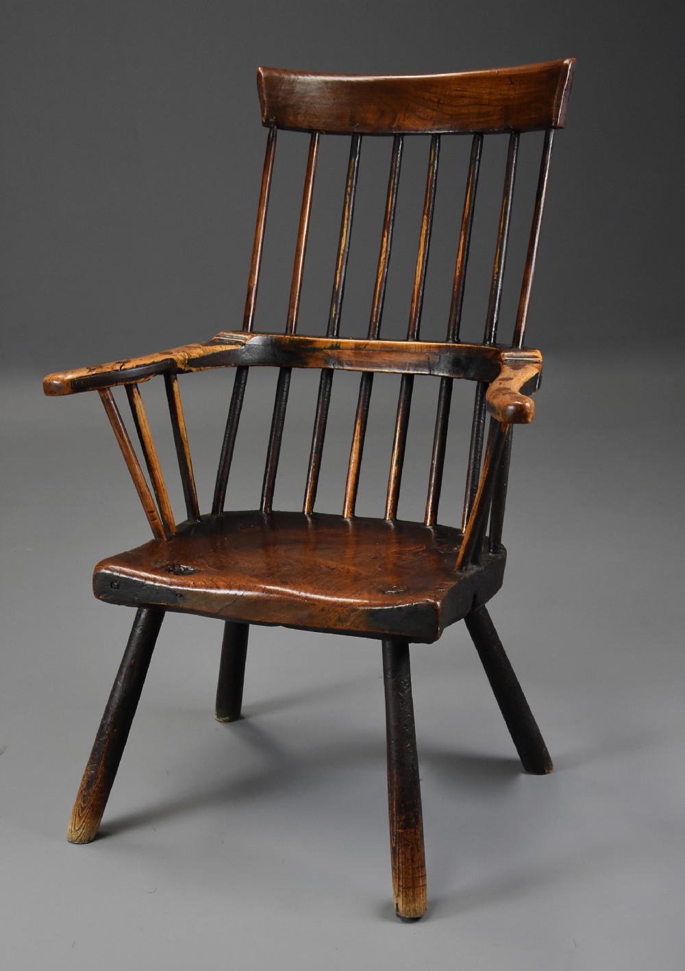 Mid 18th century primitive ash and elm comb back armchair with exceptional original patina