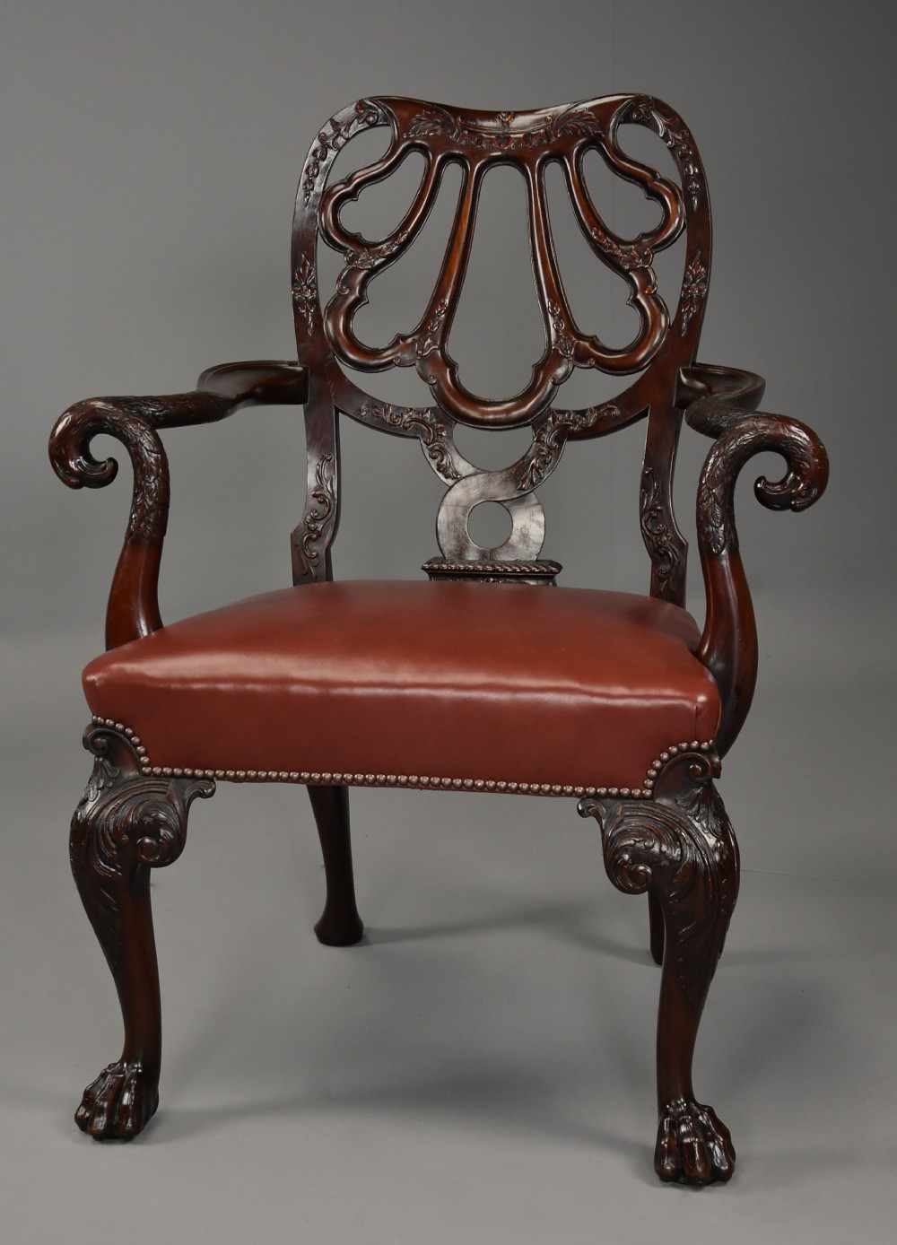 Superb quality late 19th century mahogany open armchair in the style of Giles Grendey