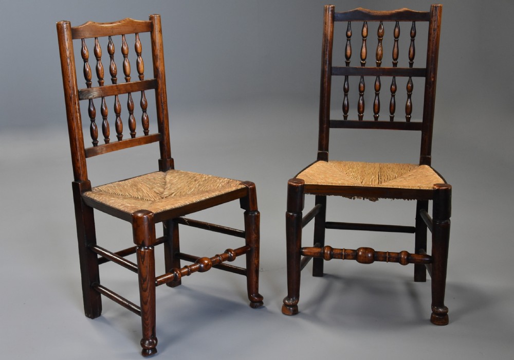 Mid 19th century matched set of ten ash, elm & sycamore spindle back chairs of superb patina View X