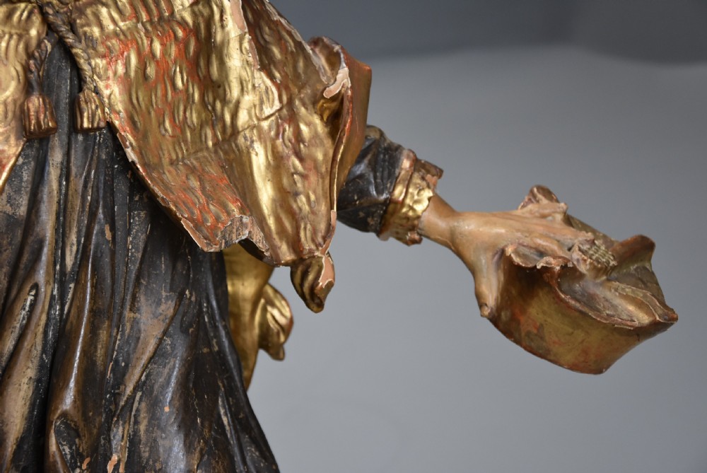 Superbly carved & highly decorative 18th century polychrome & gilt figure, probably Saint John of Nepomuk View VIII