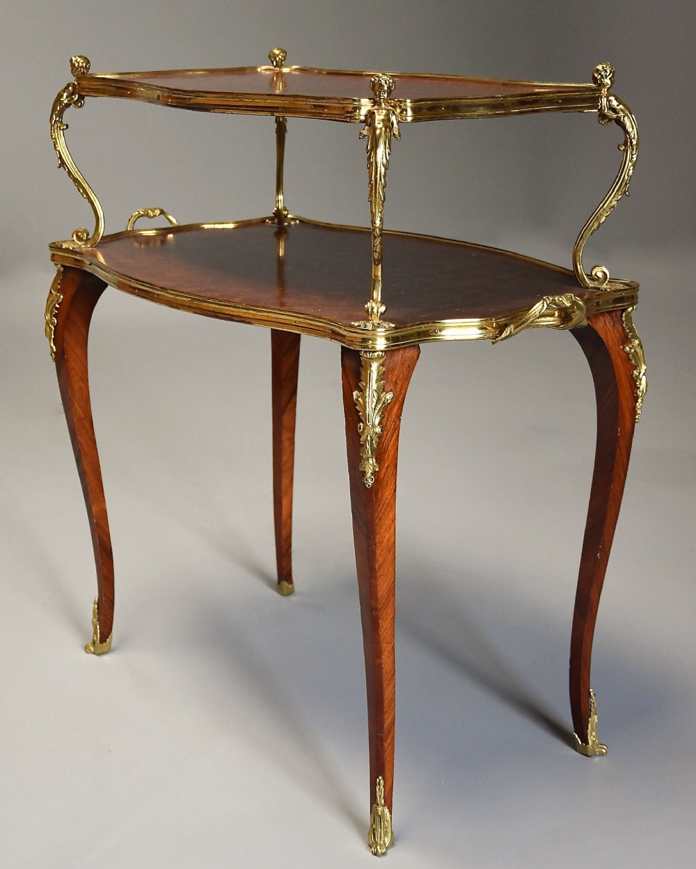 Fine quality late 19thcentury French Kingwood parquetry two tier serpentine shaped etagere