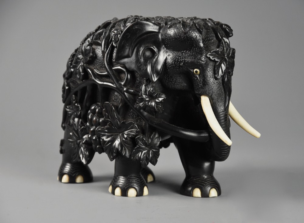 Rare mid 19th century finely carved Ceylonese ebony elephant from the Galle district of Sri Lanka (formerly Ceylon) View II