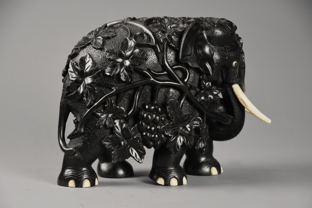 Rare mid 19th century finely carved Ceylonese ebony elephant from the Galle district of Sri Lanka (formerly Ceylon) View III