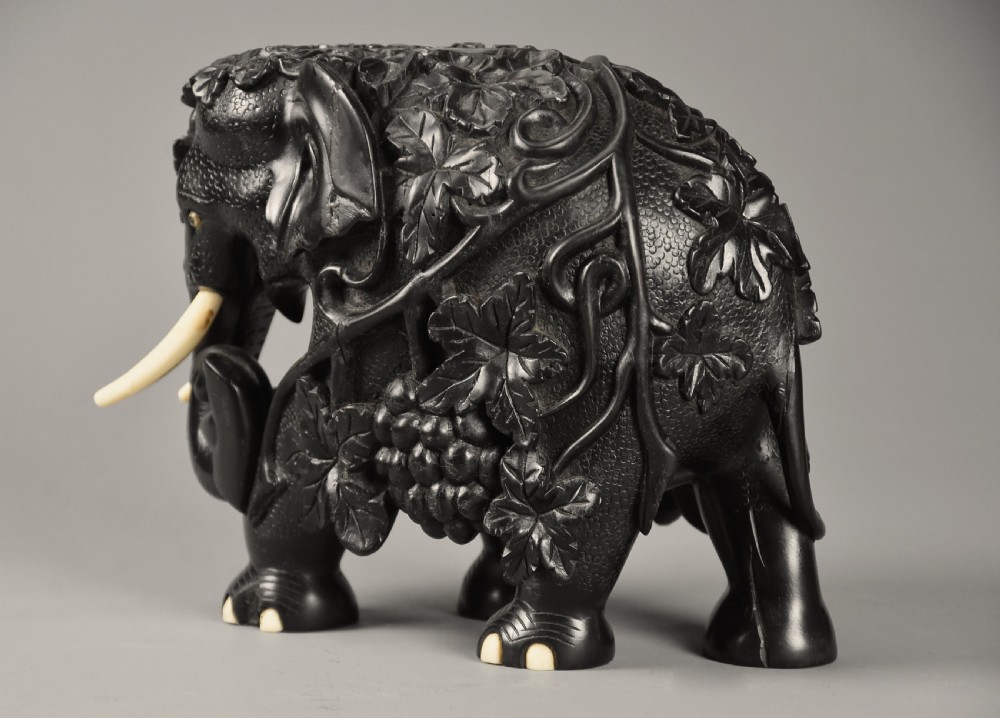 Rare mid 19th century finely carved Ceylonese ebony elephant from the Galle district of Sri Lanka (formerly Ceylon) View V