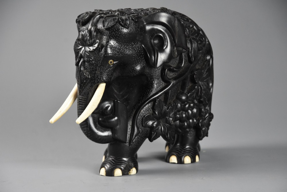 Rare mid 19th century finely carved Ceylonese ebony elephant from the Galle district of Sri Lanka (formerly Ceylon) View VII