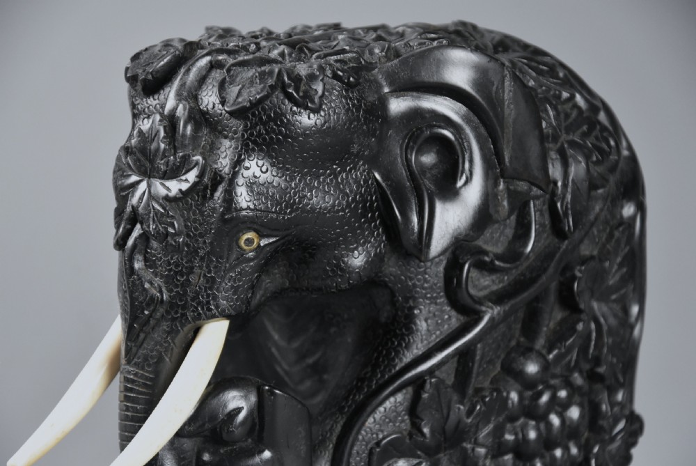 Rare mid 19th century finely carved Ceylonese ebony elephant from the Galle district of Sri Lanka (formerly Ceylon) View VIII