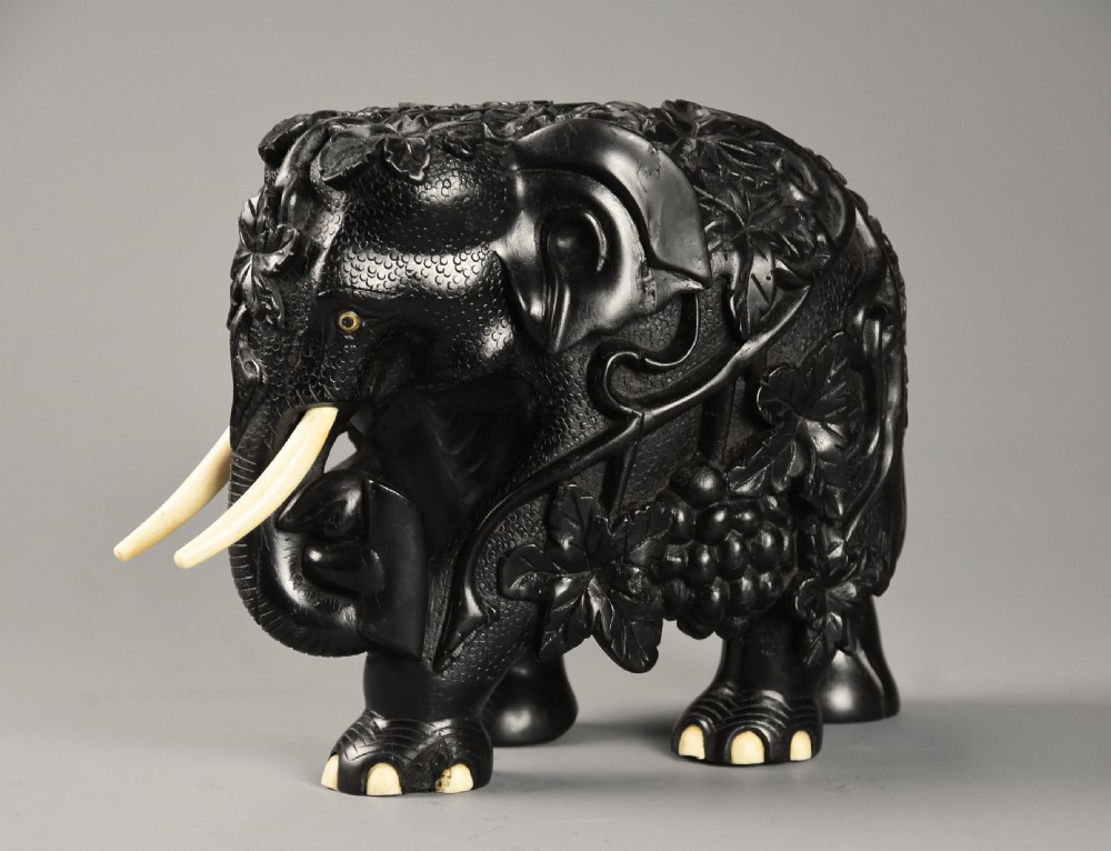 Rare mid 19th century finely carved Ceylonese ebony elephant from the Galle district of Sri Lanka (formerly Ceylon) View IX