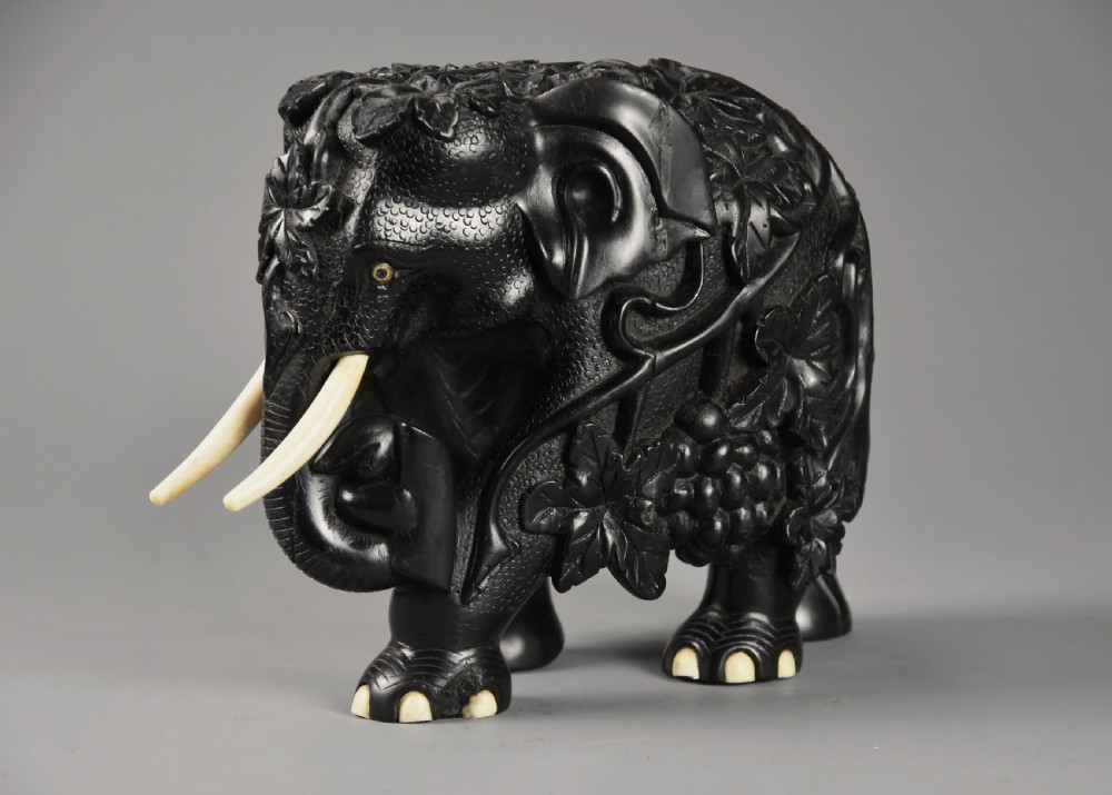Rare mid 19th century finely carved Ceylonese ebony elephant from the Galle district of Sri Lanka (formerly Ceylon) View X