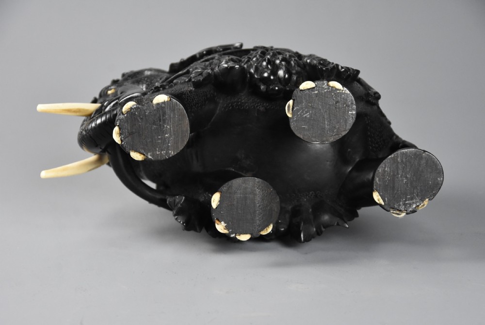 Rare mid 19th century finely carved Ceylonese ebony elephant from the Galle district of Sri Lanka (formerly Ceylon) View XIV