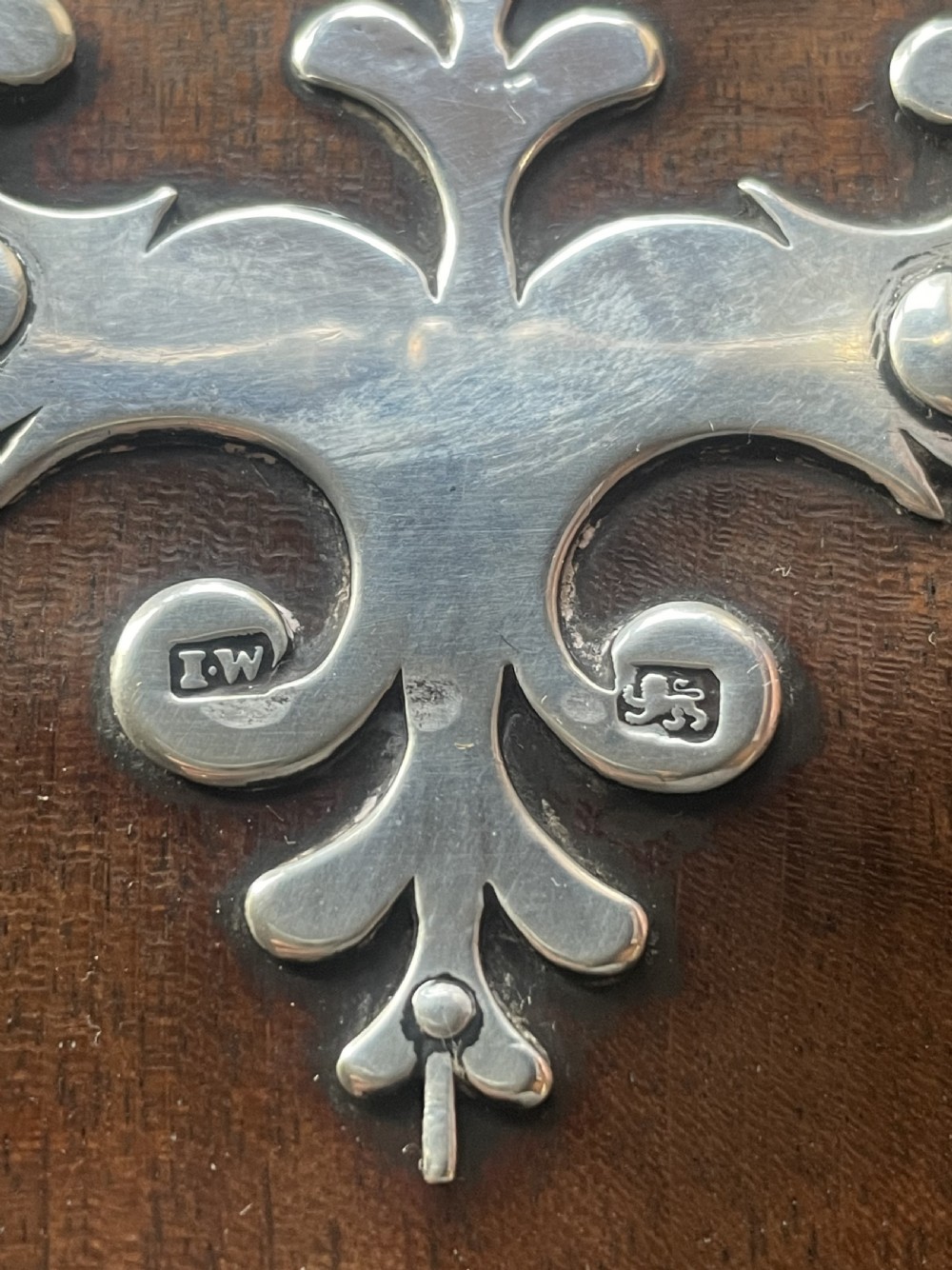 A pair of late eighteenth-century bow-front mahogany cutlery boxes with silver mounts and claw feet. View XIV