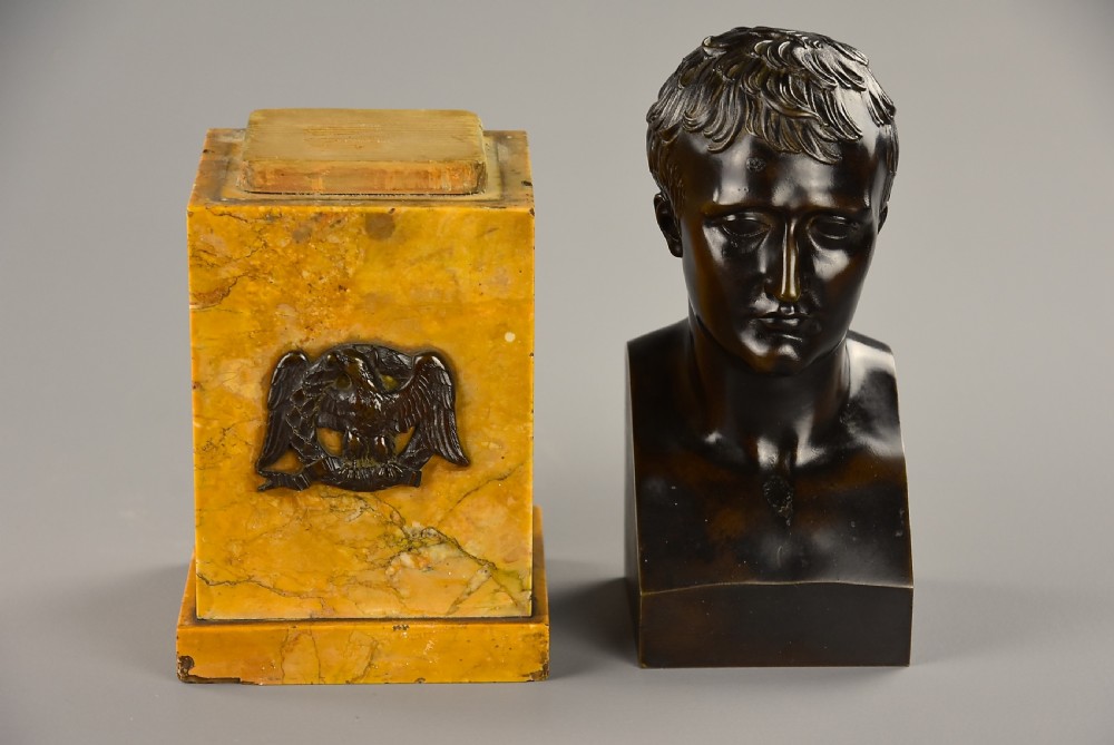 A dark patinated bronze bust of Napoleon Bonaparte mounted on a yellow marble plinth decorated with a bronze eagle mount. View XII