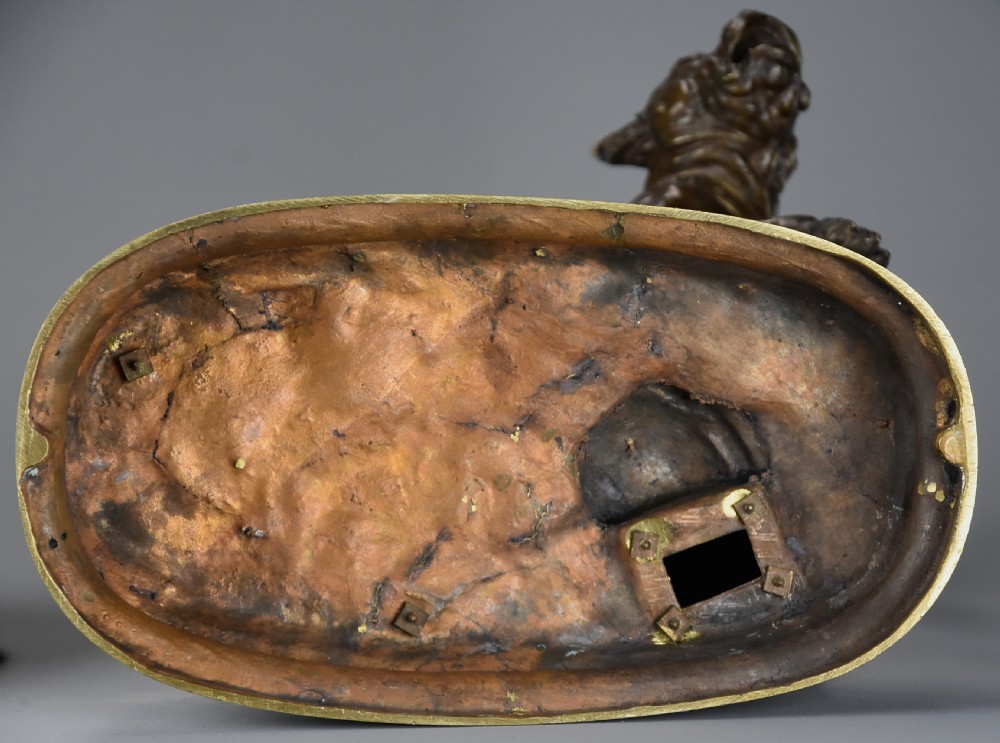 A 19th-century dark bronze sculpture of a chained guard dog rearing against a post, mounted on a brass collar and red veined marble base. View XXI