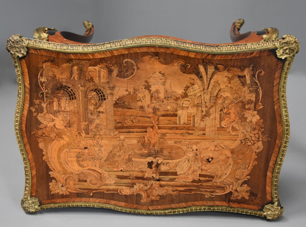 A mid-19th century French style kingwood centre table featuring detailed floral marquetry, curved cabriole legs, and polished ormolu mounts. View XII