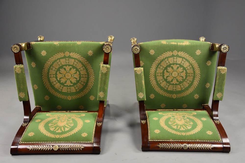 Pair of late 19th-century French Empire style mahogany open armchairs upholstered in green patterned fabric with brass mounts and paw feet. View XI
