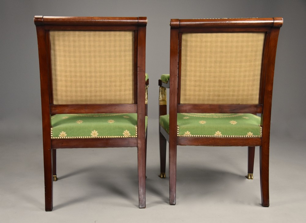 Pair of late 19th-century French Empire style mahogany open armchairs upholstered in green patterned fabric with brass mounts and paw feet. View XIII