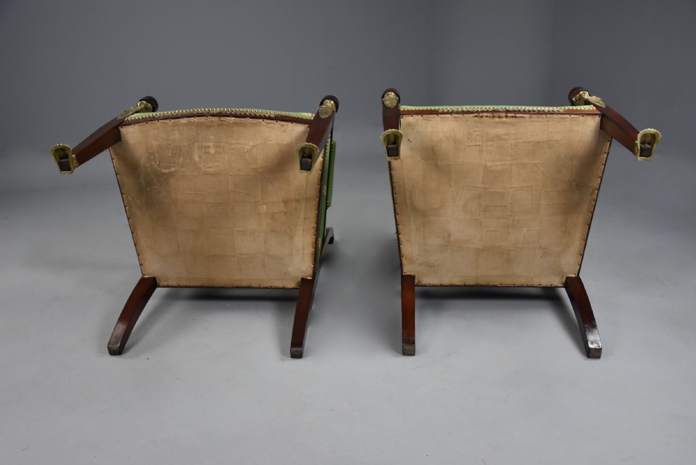 Pair of late 19th-century French Empire style mahogany open armchairs upholstered in green patterned fabric with brass mounts and paw feet. View XIV