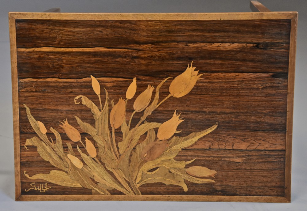 A set of three graduating French Art Nouveau rosewood nesting tables with floral marquetry tops and slender tapered legs. View VIII