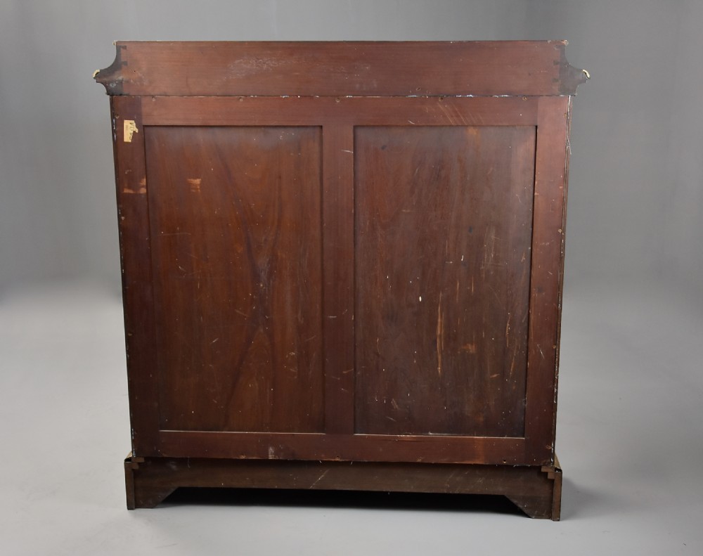 Mid-19th century French kingwood display cabinet with two glazed doors, ornate gilt-bronze ormolu mounts, and a blue fabric-lined interior. View XIII