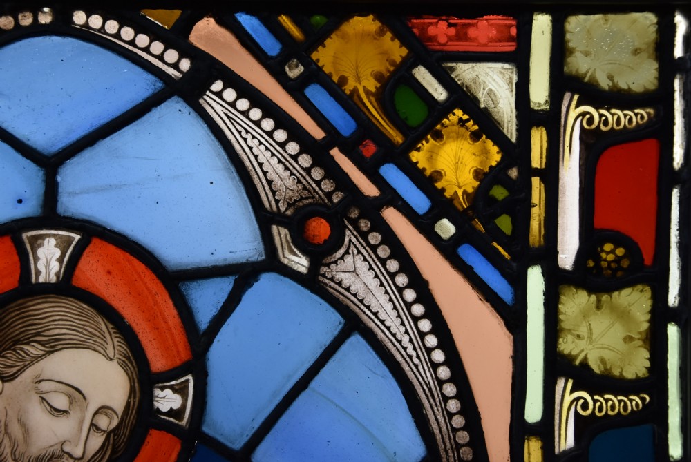 A vertical three-part Victorian Gothic Revival stained glass panel depicting the Ascension of Christ with detailed painted leaded features. View X