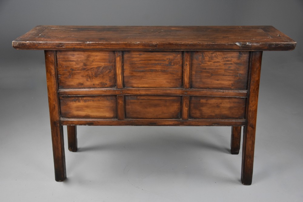 A late nineteenth-century rustic Chinese elm sideboard featuring three upper doors with contoured panels and three lower drawers fitted with metal ring pulls. View XIII
