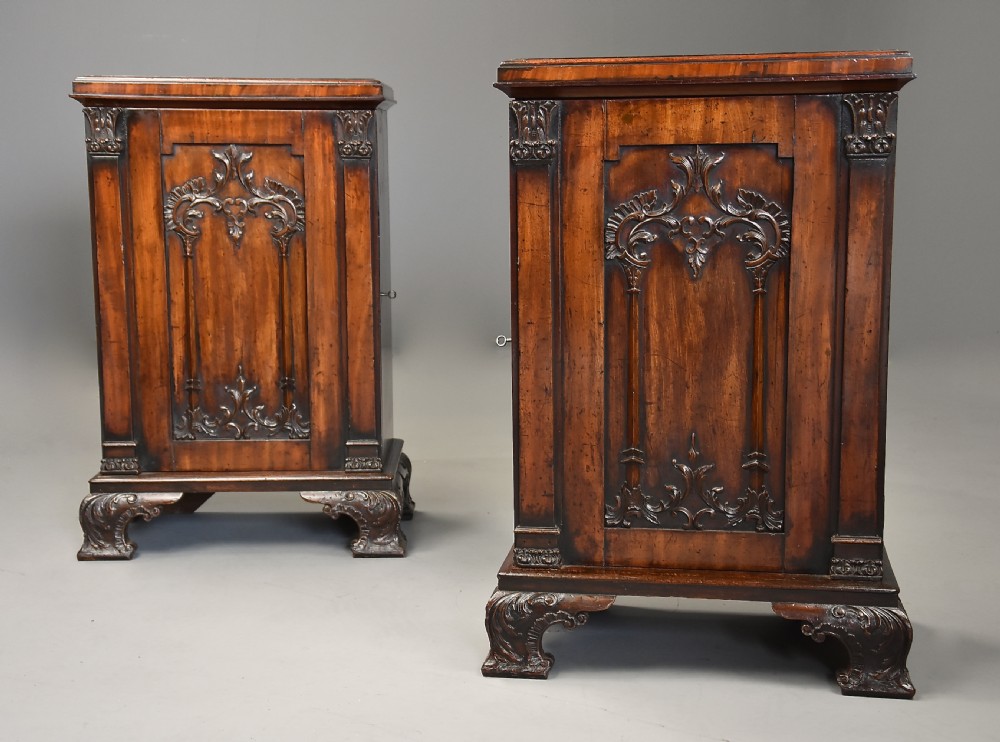 A pair of mid-18th-century mahogany Chippendale pedestal cabinets featuring relief-carved Rococo door panels, corner pilasters, and carved bracket feet. View VII