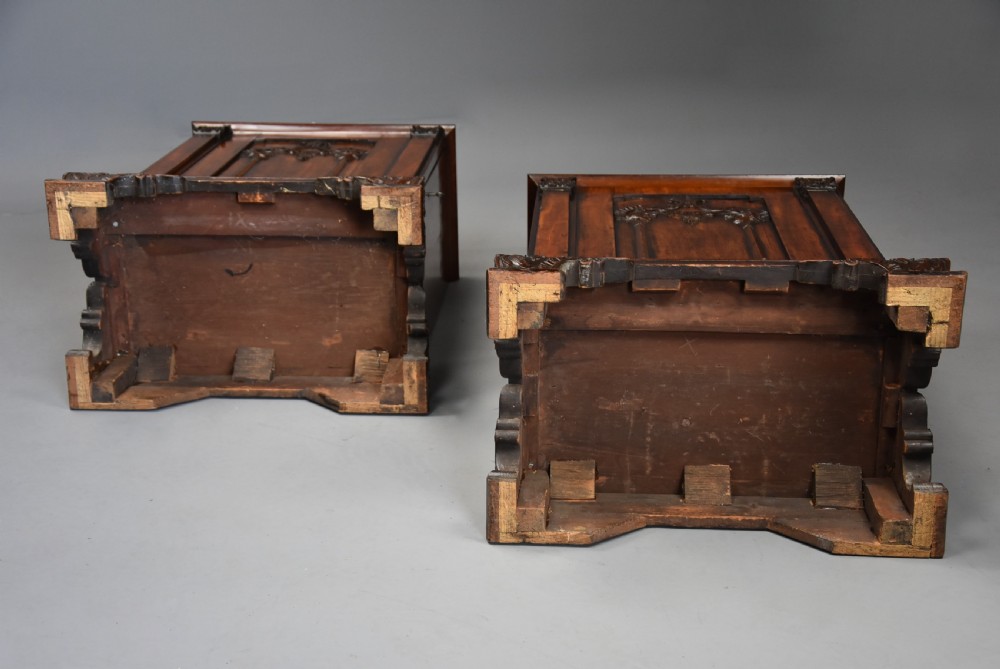 A pair of mid-18th-century mahogany Chippendale pedestal cabinets featuring relief-carved Rococo door panels, corner pilasters, and carved bracket feet. View XVIII