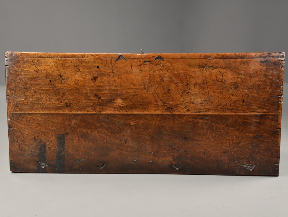 Early seventeenth-century Northern Italian cypress wood coffer decorated with detailed incised panels depicting mythical beasts and heraldic symbols. View VI