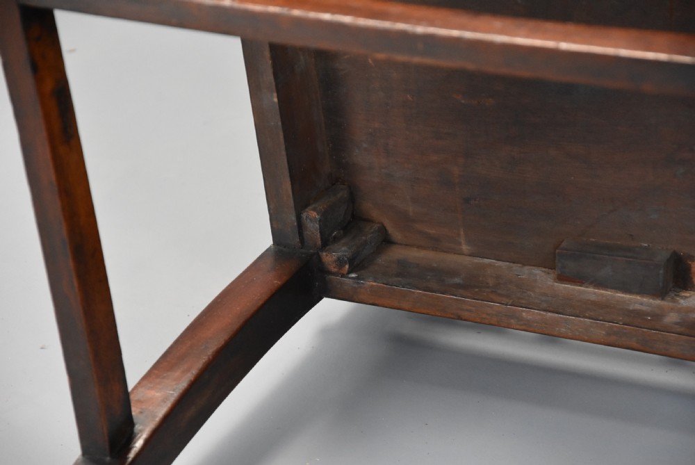 A pair of 18th-century mahogany open armchairs featuring intricate geometric Chinese lattice backrests, fretted arm supports, and carved straight legs. View XVII