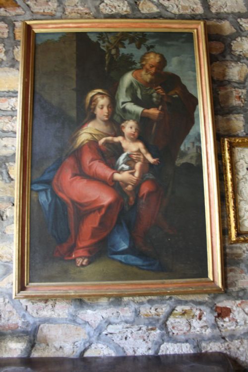 fig 1. An 18th-century oil painting on canvas depicting the Holy Family set in a narrow gilded wooden frame.