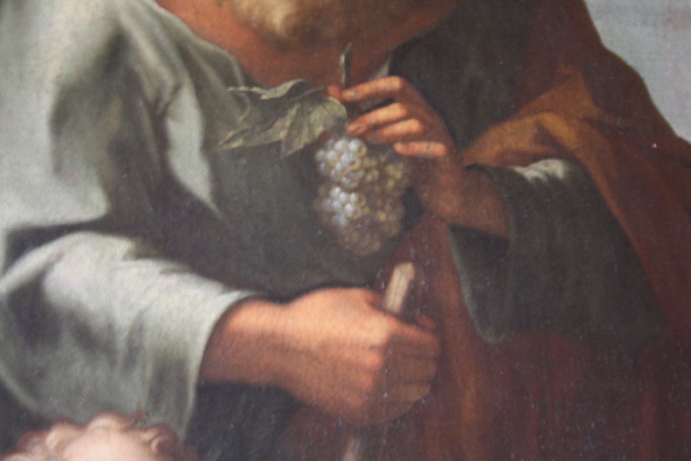 An 18th-century oil painting on canvas depicting the Holy Family set in a narrow gilded wooden frame. View V