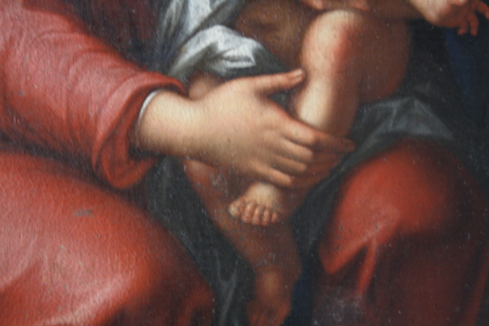 An 18th-century oil painting on canvas depicting the Holy Family set in a narrow gilded wooden frame. View VII
