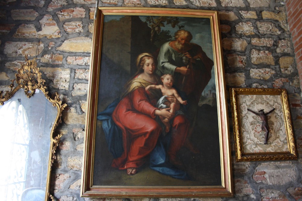 An 18th-century oil painting on canvas depicting the Holy Family set in a narrow gilded wooden frame. View XII