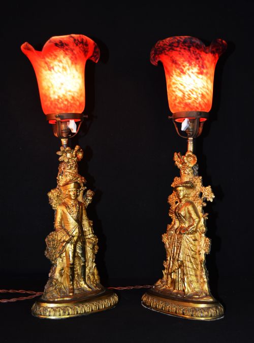 Last of the Mohicans. His & Hers Set of two Gilt Brass Figural bedside lamps by Cornelius & Co
