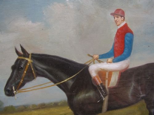 fig 2. SPORTING OIL ON CANVAS OF MOUNTED JOCKEY IN FULL RACING COLOURS & PRESENTED IN BURR-WALNUT FRAME
UNDER GLASS 20.5 X 15.5 INCHES