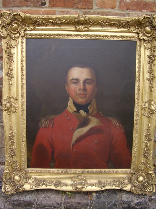fig 7. OIL PORTRAIT PAINTING MANNER OF SIR THOMAS LAWRENCE OF A BRITISH ARMY OFFICER IN HIS RED COAT TUNIC UNIFORM DATING (1795-1802) LATE 18TH-EARLY 19TH CENTURY ENGLISH SCHOOL IN A MAGNIFICENT DECORATIVE GILT-WOOD FRAME 35 X 40 INCHES