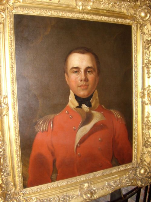 fig 1. OIL PORTRAIT PAINTING MANNER OF SIR THOMAS LAWRENCE OF A BRITISH ARMY OFFICER IN HIS RED COAT TUNIC UNIFORM DATING (1795-1802) LATE 18TH-EARLY 19TH CENTURY ENGLISH SCHOOL IN A MAGNIFICENT DECORATIVE GILT-WOOD FRAME 35 X 40 INCHES