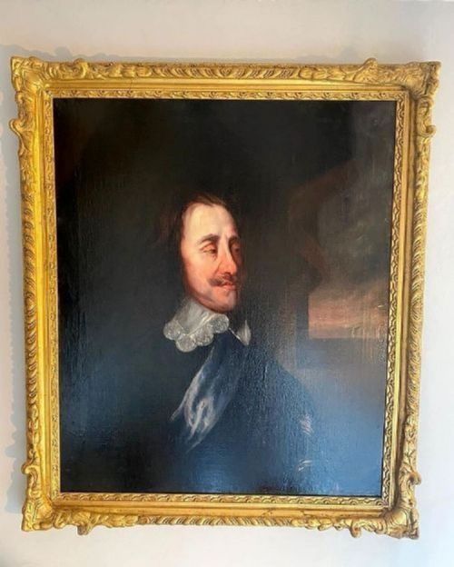 fig 1. A seventeenth-century bust-length oil portrait of King Charles I presented in a carved giltwood frame.
